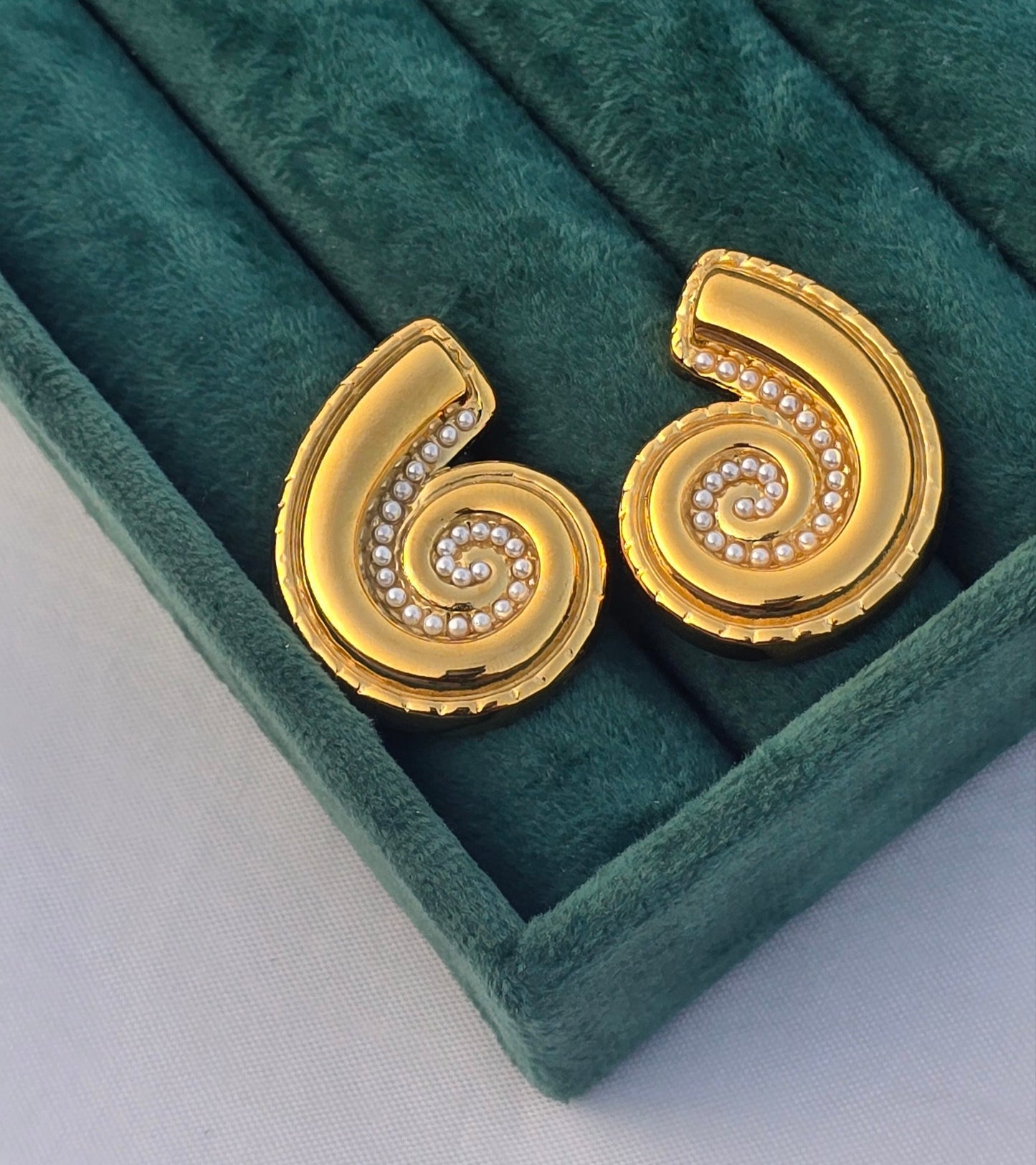 Golden swirl studs